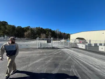 Drive gates and perimeter fence at a commercial storage facility