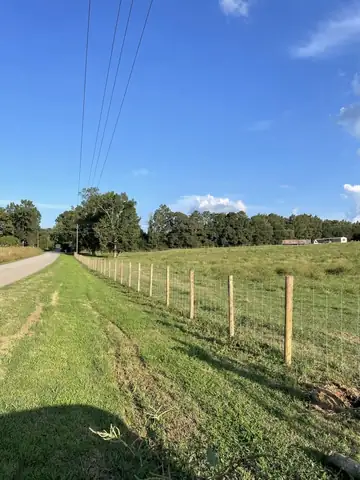 Wire fence along a country road frontage