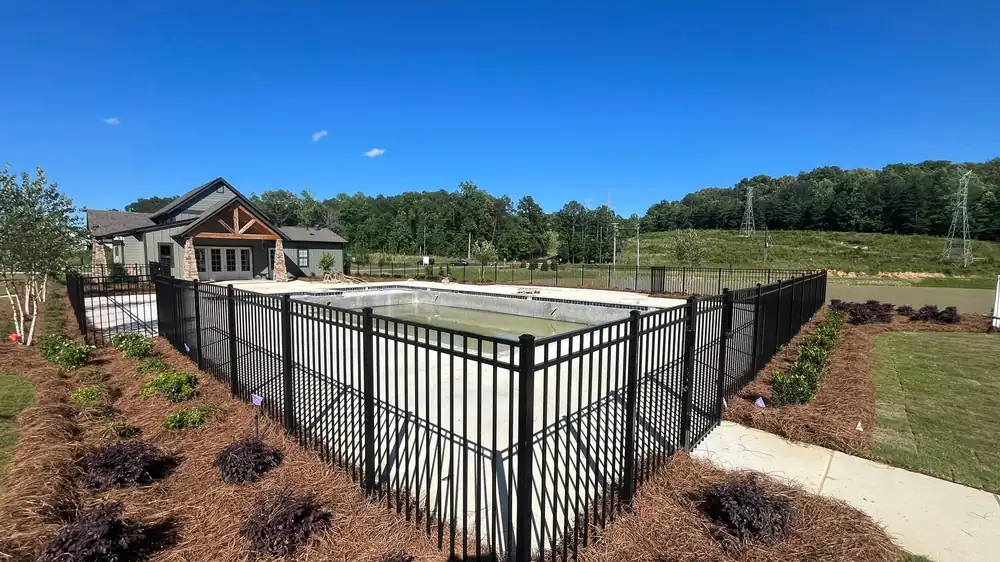 Black aluminum pool fence at an Alabama home