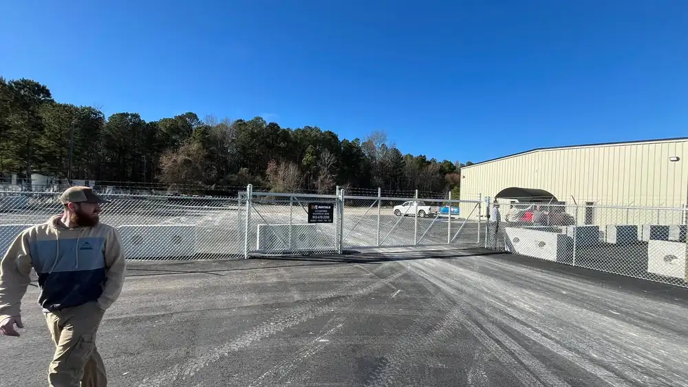 Commercial chain link perimeter fence and gates at an Alabama storage facility